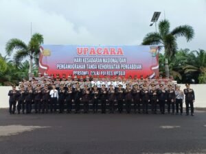 Kapolres Mesuji Melaksanakan Upacara Hari Kesadaran Nasional Dan Penganugrahan Tanda Kehormatan Pengabdian Personel