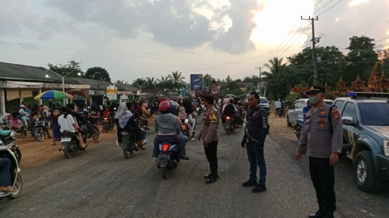 Anggota Polsek Tanjung Raya Polres Mesuji Laksanakan Pengamanan Arak-Arakan Ogoh-Ogoh Jelang Hari Raya Nyepi
